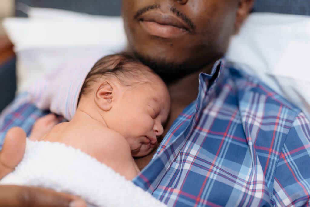 Father holding baby