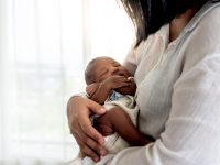 Mom holding baby